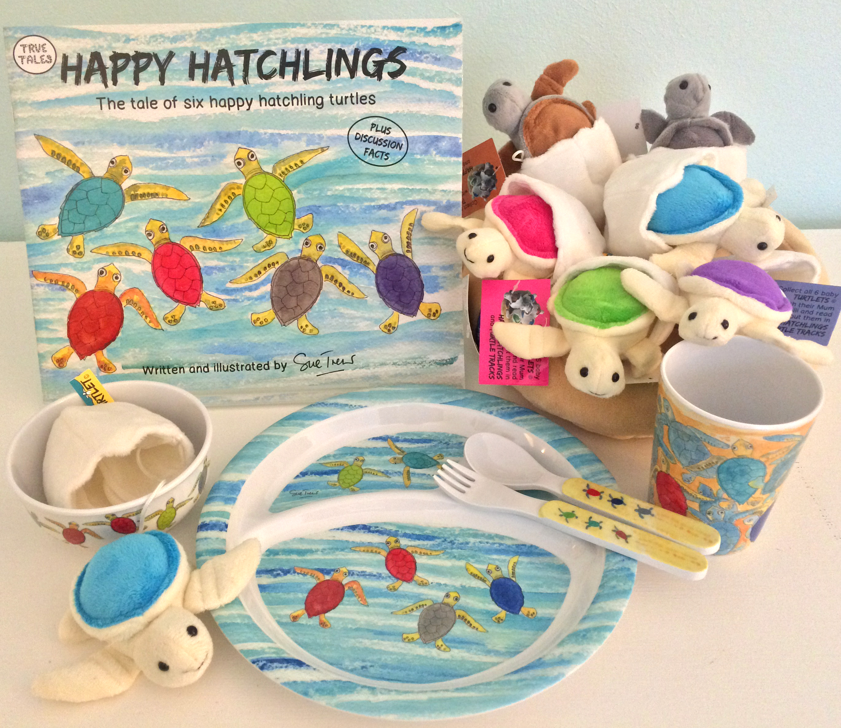 Sue Trew's second book Happy Hatchlings with a nest of hatchlings and matching melamine dinnerware.